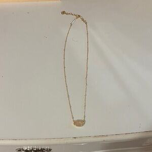 Elegant Gold Necklace with Gemstone
Brand new only wore once